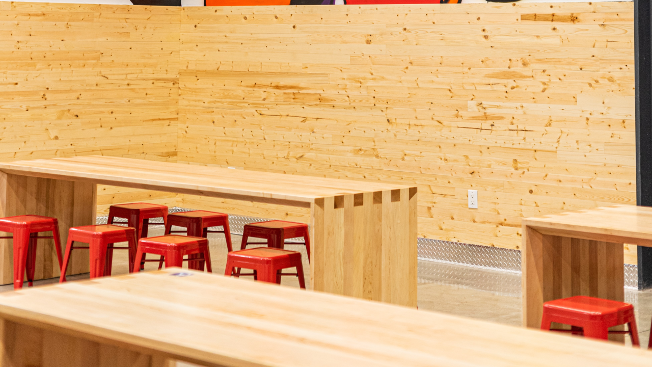 Close up image of seating options available at Dave's Hot Chicken in Fountain Valley, CA.