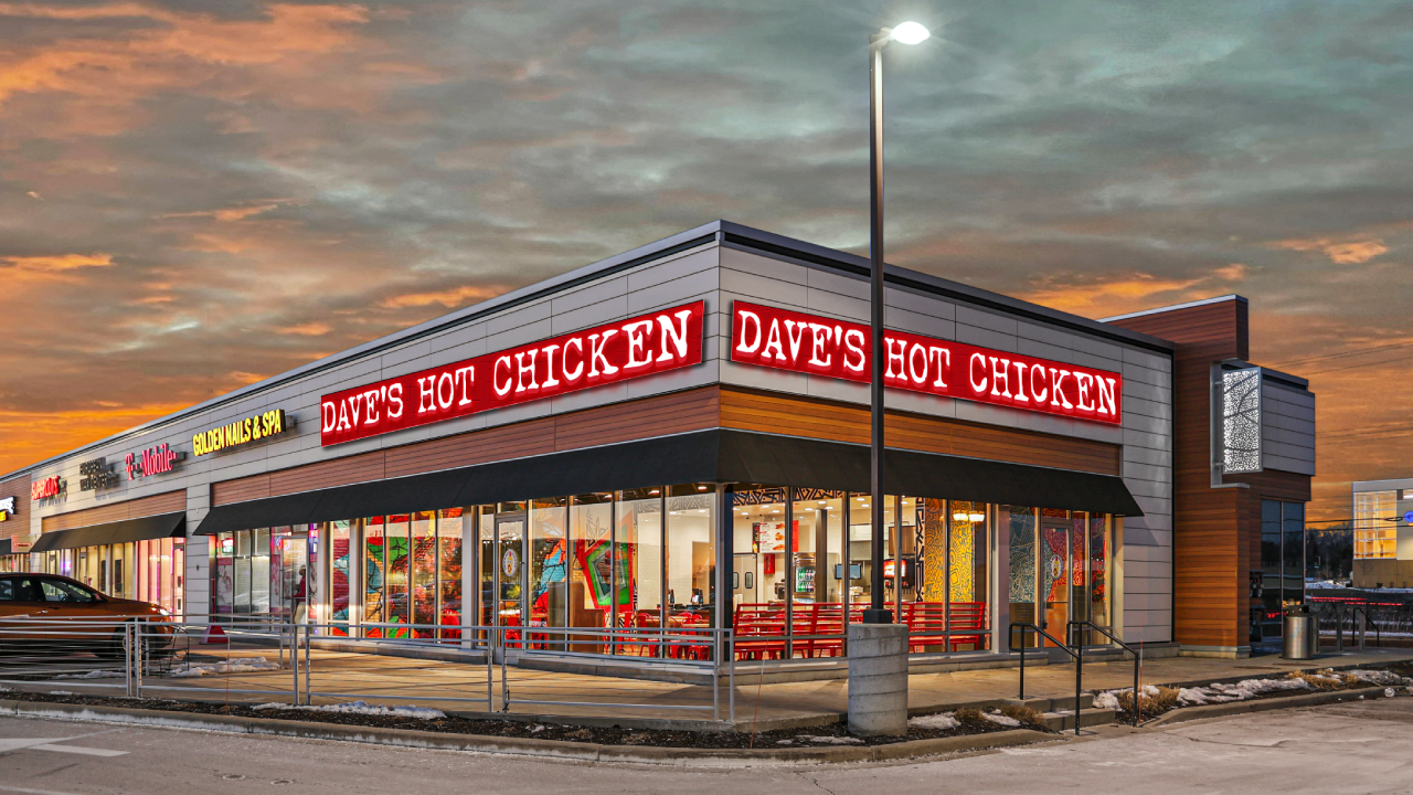 Angled sunset image of Dave's Hot Chicken location in Menomonee Falls