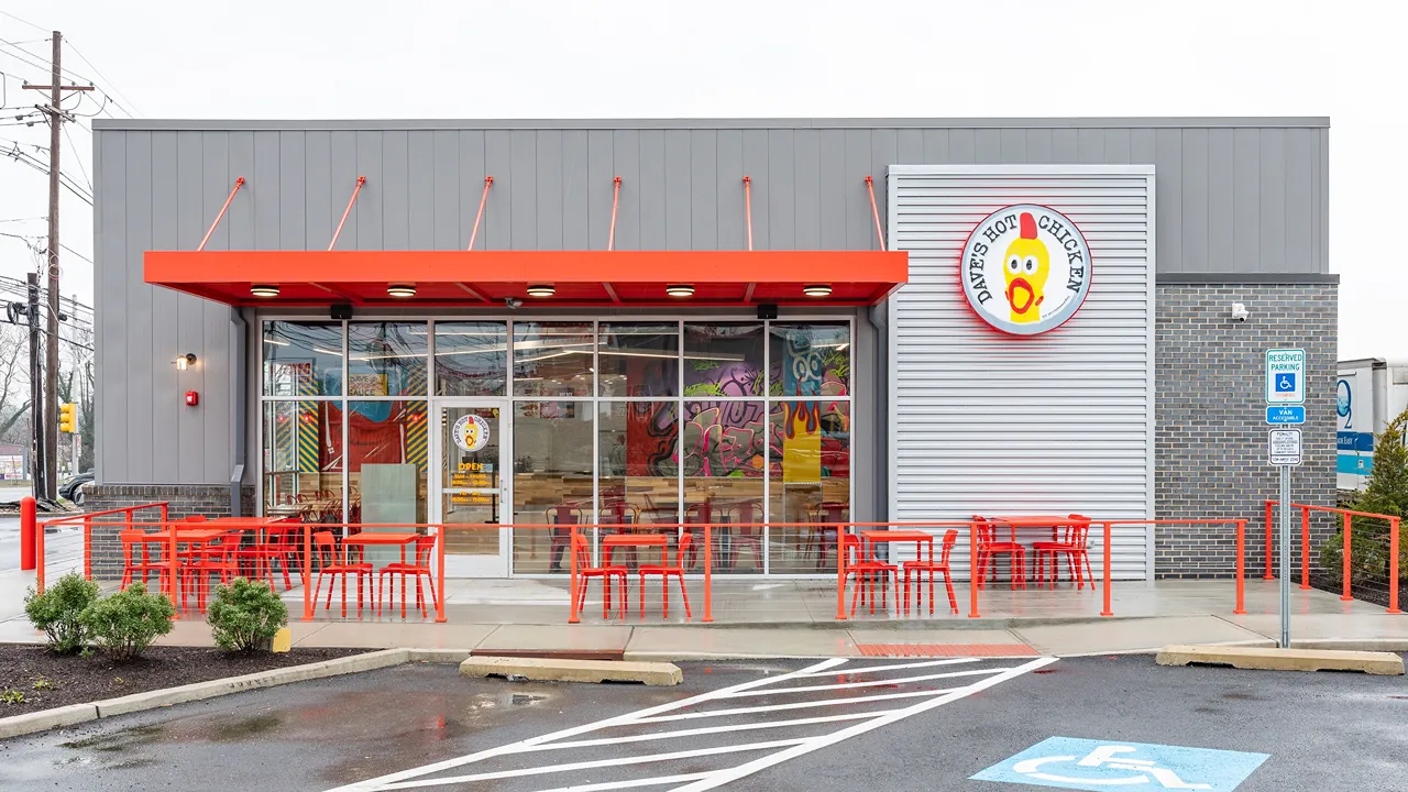 Dave's Hot Chicken Cherry Hill NJ – Ellisburg exterior view with visible parking area and signage.