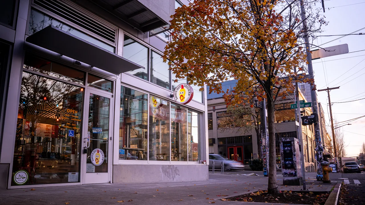 Exterior view of Dave's Hot Chicken on E. Pike St, Seattle, WA, showing the front entrance and signage.