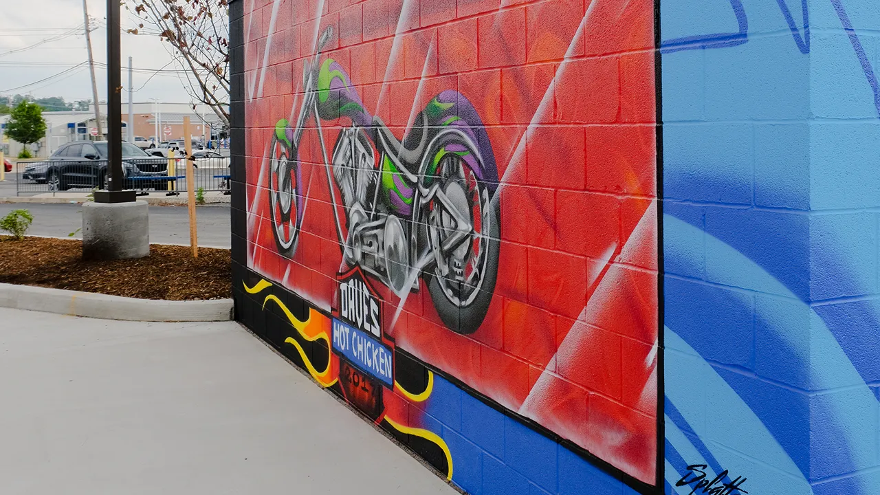 Large motorcycle mural painted on the exterior wall at Dave's Hot Chicken, Loucks Rd., York, PA.