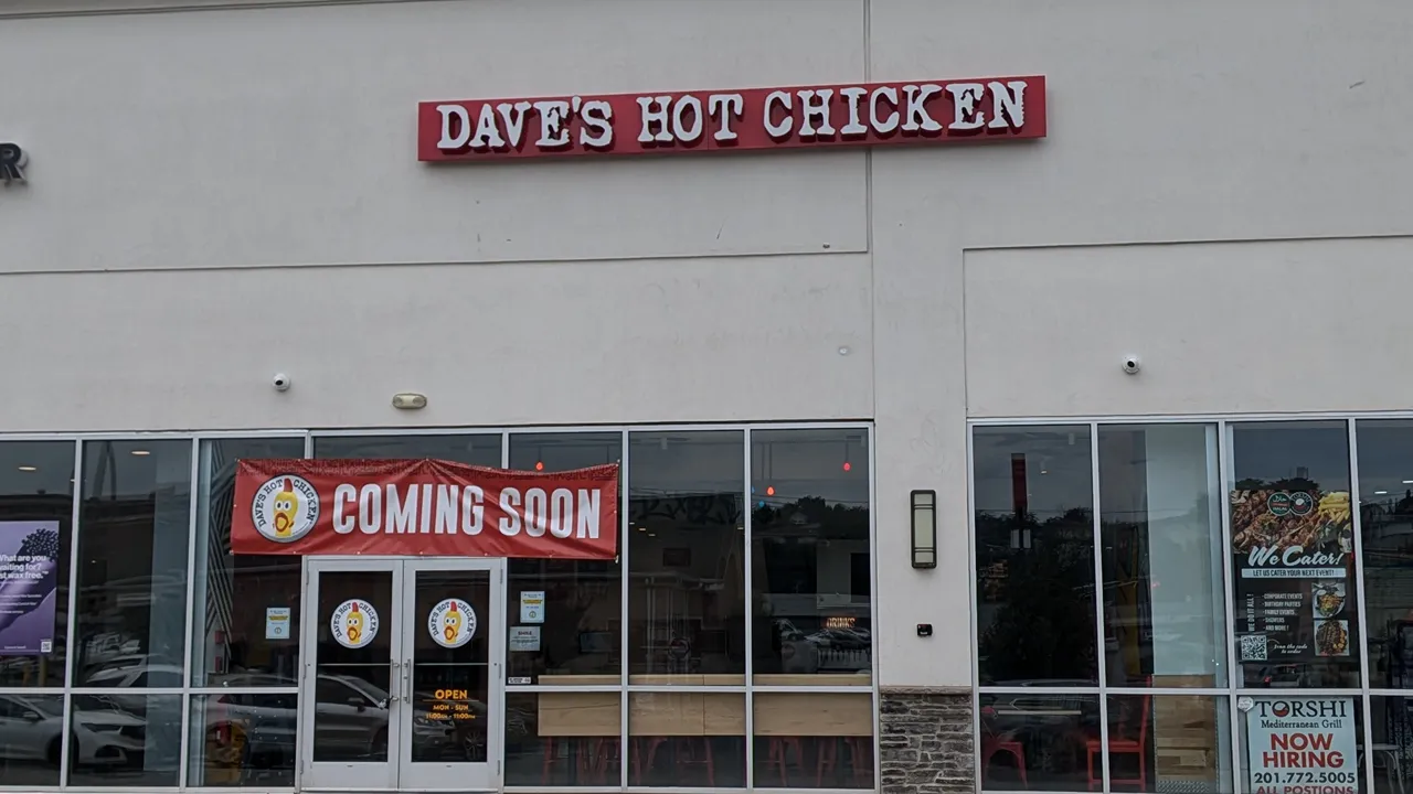 Exterior view of Dave's Hot Chicken on Passaic Ave, Kearny, NJ, with a 