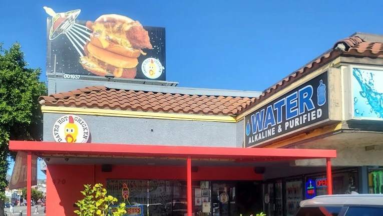 Exterior view of a Dave's Hot Chicken restaurant on Western Avenue in Los Angeles, CA.