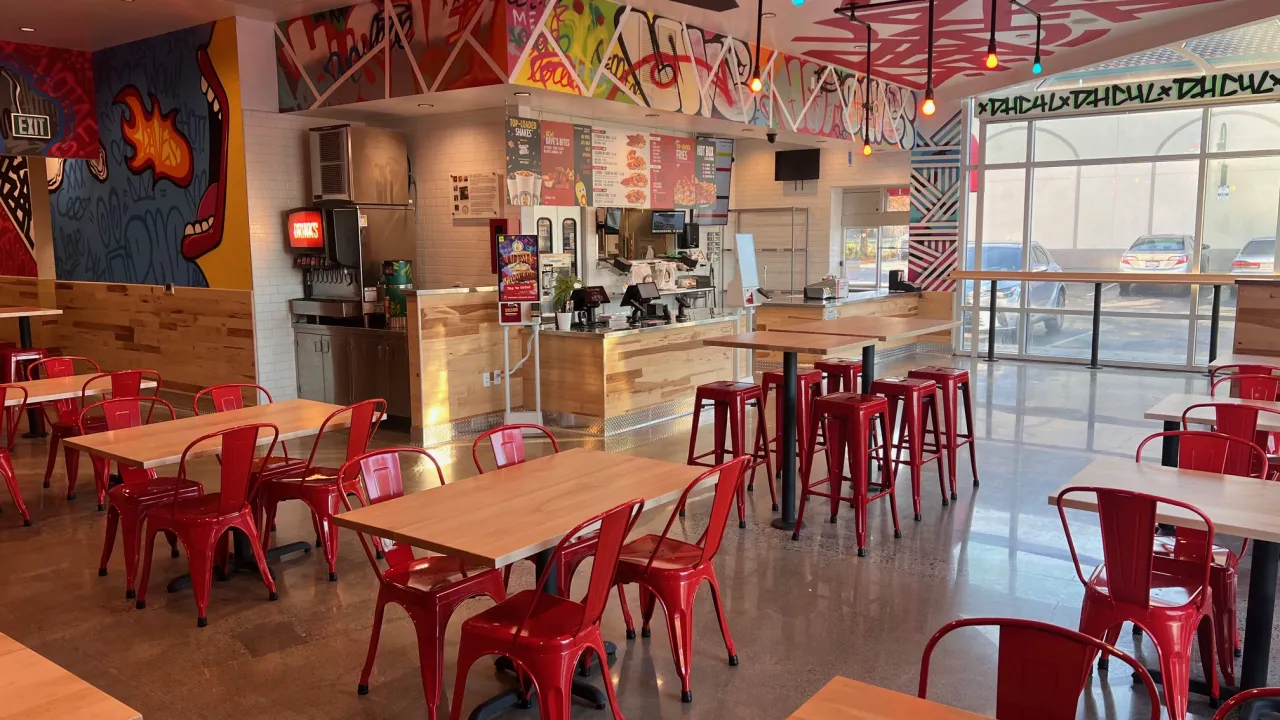 Interior view of Dave’s Hot Chicken at 917 Dana Dr, Redding, CA, showcasing the counter and seating area.