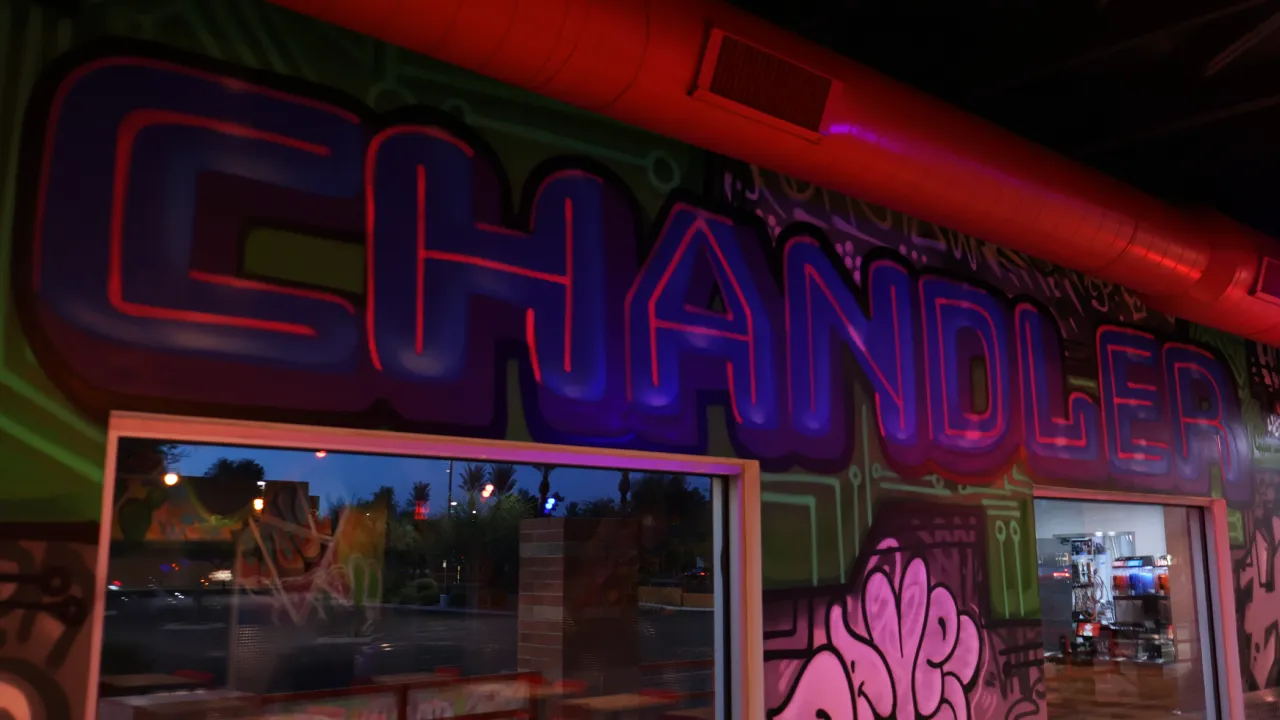 Interior view of a mural at Dave's Hot Chicken on Chandler Blvd, Chandler, AZ, featuring vibrant graffiti artwork.